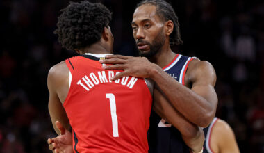 HOUSTON, TEXAS - DECEMBER 11: Amen Thompson #1 of the Houston Rockets greets Kawhi Leonard #2 of the Los Angeles Clippers after the game at Toyota Center on December 11, 2025 in Houston, Texas. NOTE TO USER: User expressly acknowledges and agrees that, by downloading and or using this photograph, User is consenting to the terms and conditions of the Getty Images License Agreement. (Photo by Tim Warner/Getty Images)