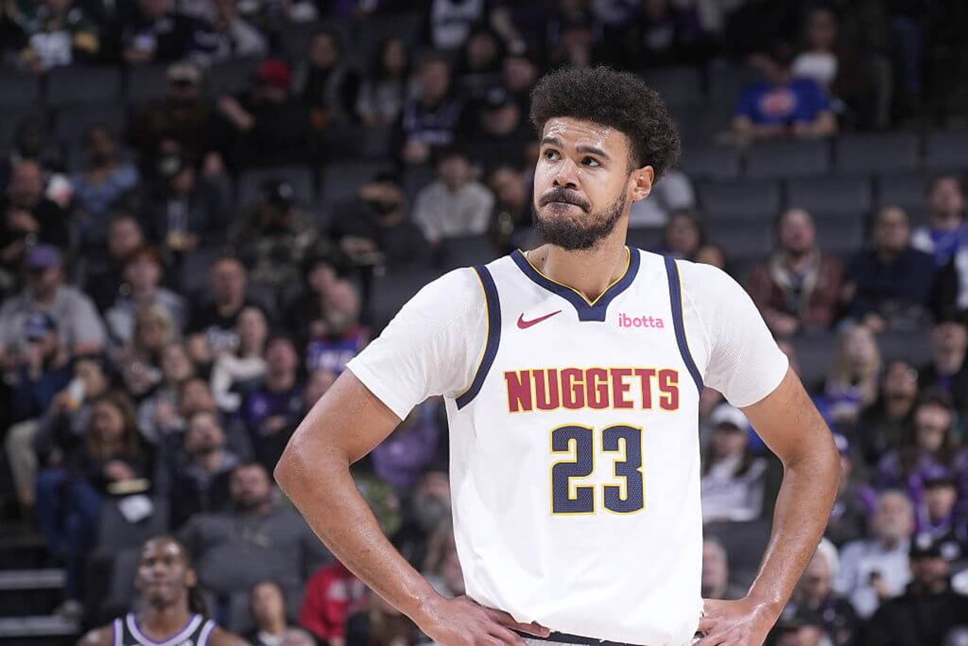 Cam Johnson looks on during a Nuggets-Kings matchup