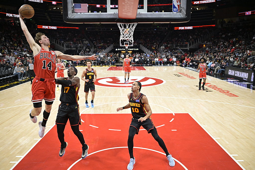 ATLANTA, GA - DECEMBER 21: Matas Buzelis #14 of Chicago Bulls dunks the ball during the game against the Atlanta Hawks on December, 21, 2025 at State Farm Arena in Atlanta, Georgia. NOTE TO USER: User expressly acknowledges and agrees that, by downloading and/or using this Photograph, user is consenting to the terms and conditions of the Getty Images License Agreement. Mandatory Copyright Notice: Copyright 2025 NBAE (Photo by Adam Hagy/NBAE via Getty Images)
