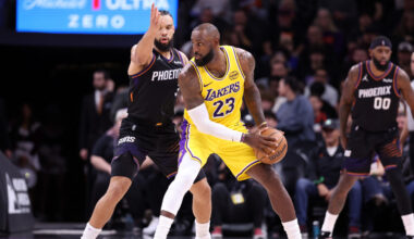 Dillon Brooks #3 of the Phoenix Suns pressures LeBron James #23 of the Los Angeles Lakers...