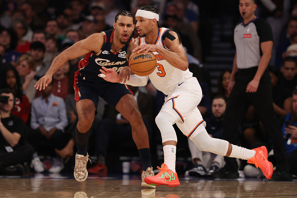 NEW YORK, NEW YORK - DECEMBER 25: Josh Hart #3 of the New York Knicks drives to the basket against Jaylon Tyson #20 of the Cleveland Cavaliers during the first quarter at Madison Square Garden on December 25, 2025 in New York City. NOTE TO USER: User expressly acknowledges and agrees that, by downloading and or using this photograph, User is consenting to the terms and conditions of the Getty Images License Agreement. (Photo by Pamela Smith/Getty Images)