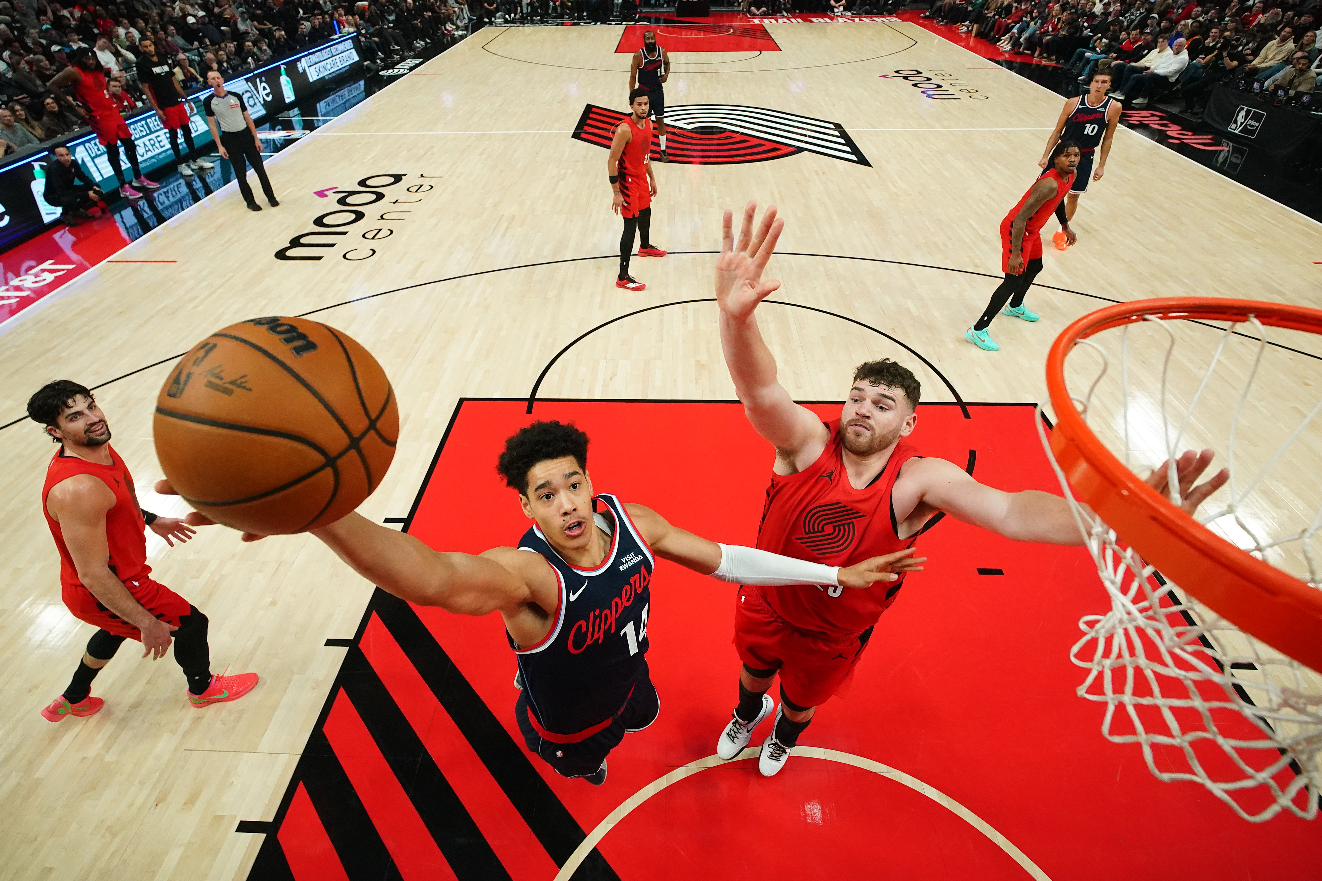 Clippers rookie center Yanic Konan Niederhauser takes a shot as...