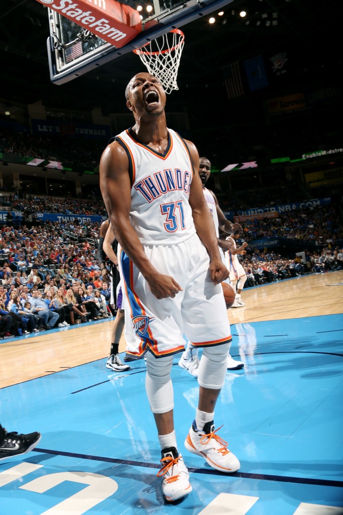 Sebastian Telfair #31 of the Oklahoma City Thunder celebrates during a game against the Sacramento Kings on November 9, 2014 at Chesapeake Energy Arena in Oklahoma City, OK. 