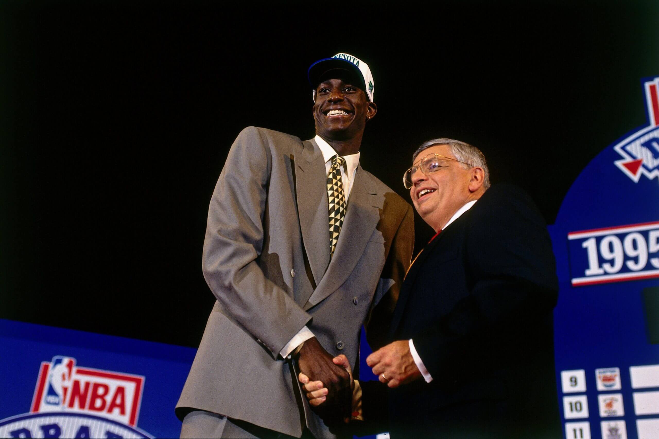 Kevin Garnett shakes the hand of then-NBA commissioner David Stern on draft day 1995. 