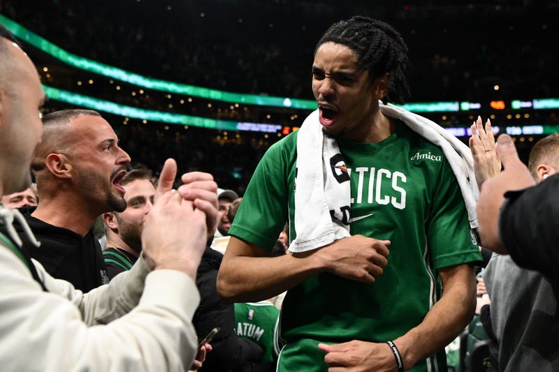 Josh Minott #8 of the Boston Celtics reacts as he walks off of the court after a game against the Los Angeles Lakers at the TD Garden on December 05, 2025 in Boston, Massachusetts.