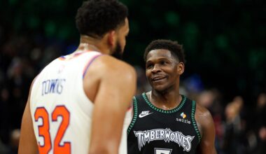 Anthony Edwards #5 of the Minnesota Timberwolves and Karl-Anthony Towns #32 of the New York Knicks interact after the game at Target Center on December 23, 2025 in Minneapolis, Minnesota. The Timberwolves defeated the Knicks 115-104.