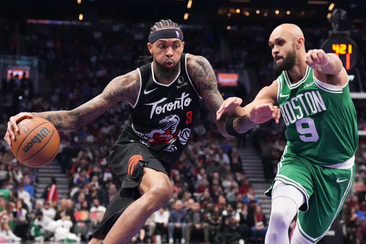 Brandon Ingram (left) scored 30 points for the Raptors, but Derrick White countered with 27 and started the Celtics' winning rally.
