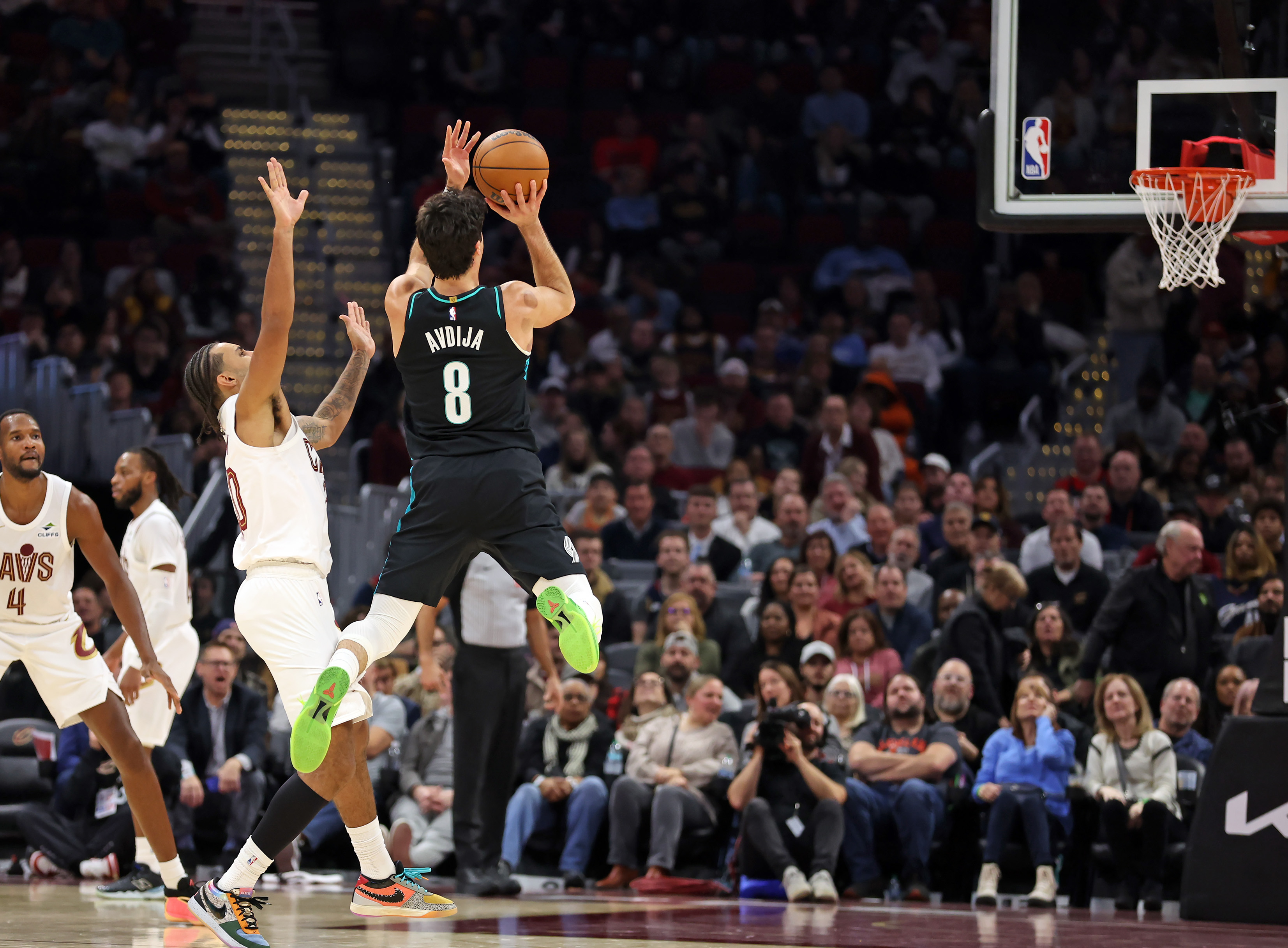 Portland Trail Blazers forward Deni Avdija shoots after drawing the foul from Cleveland Cavaliers guard Jaylon Tyson in the first half of play. 