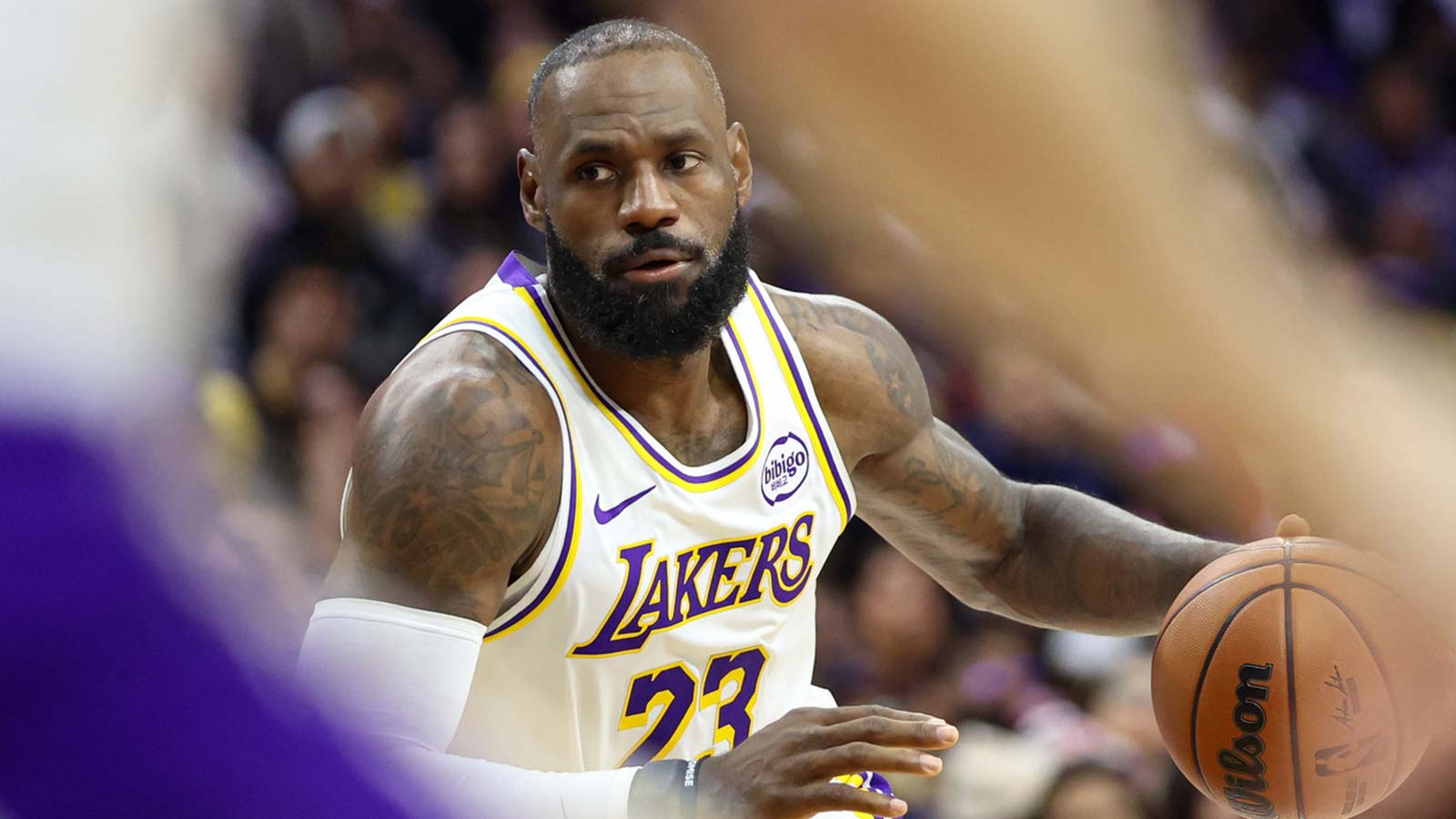 Los Angeles Lakers forward Lebron James (23) dribbles the ball against the Philadelphia 76ers during the fourth quarter at Xfinity Mobile Arena.