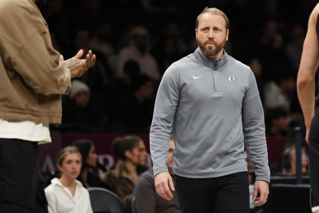 Brooklyn Nets assistant coach Steve Hetzel calls a timeout during the first half of an NBA basketball game against the Milwaukee Bucks, Sunday, Dec. 14, 2025, in New York. (AP Photo/Heather Khalifa)