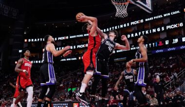 Houston Rockets center Alperen Sengun (28) shoots against Sacramento Kings center Maxime Raynaud (42) during the second half of an NBA basketball game in Houston, Wednesday, Dec. 3, 2025. (AP Photo/Ashley Landis)