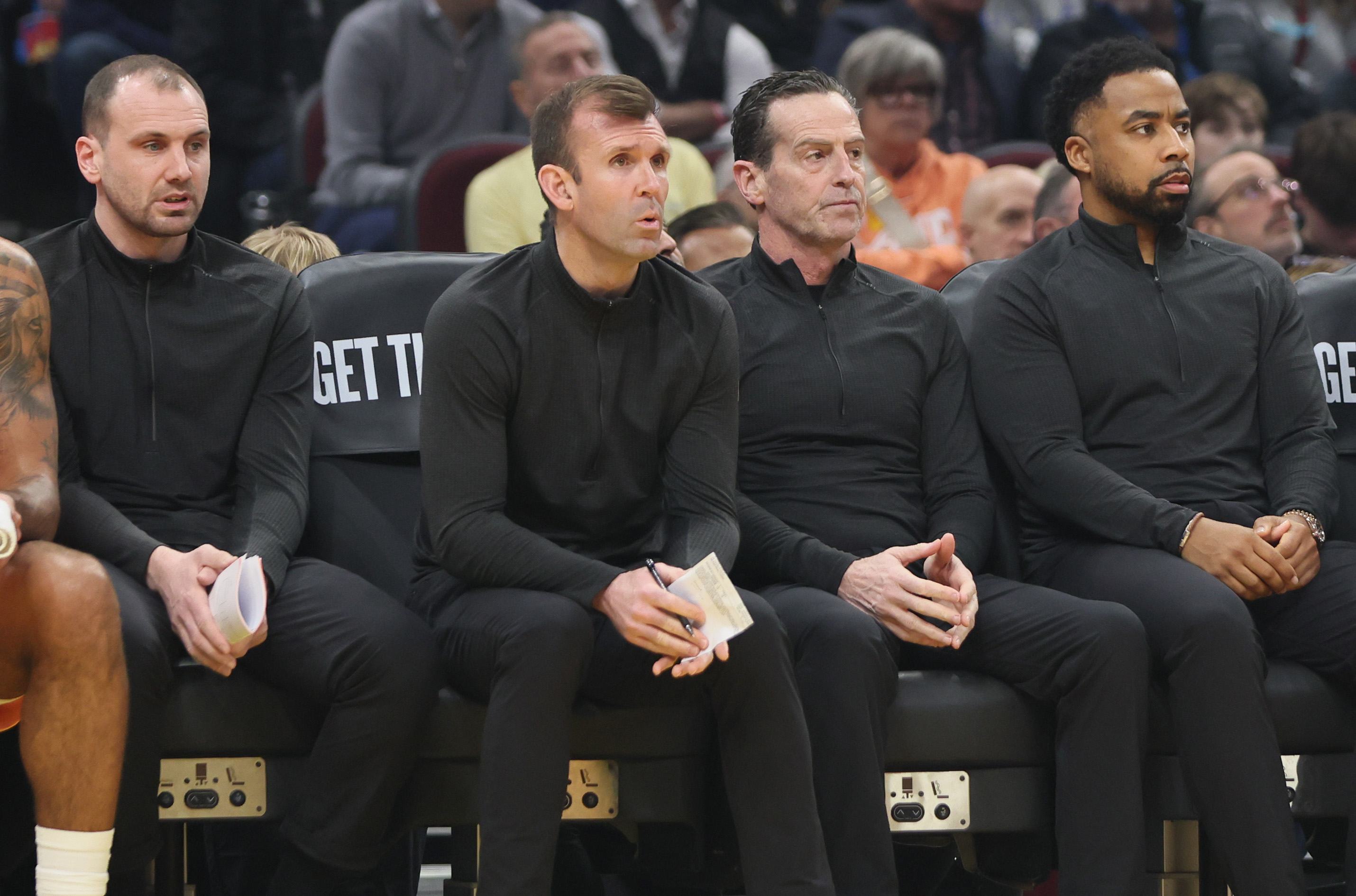 Cleveland Cavaliers coaches (L-R) assistant coach Trevor Henry, assistant coach Mike Gerrity, head coach Kenny Atkinson and associate head coach Johnnie Bryant on the bench against the Charlotte Hornets at Rocket Arena.