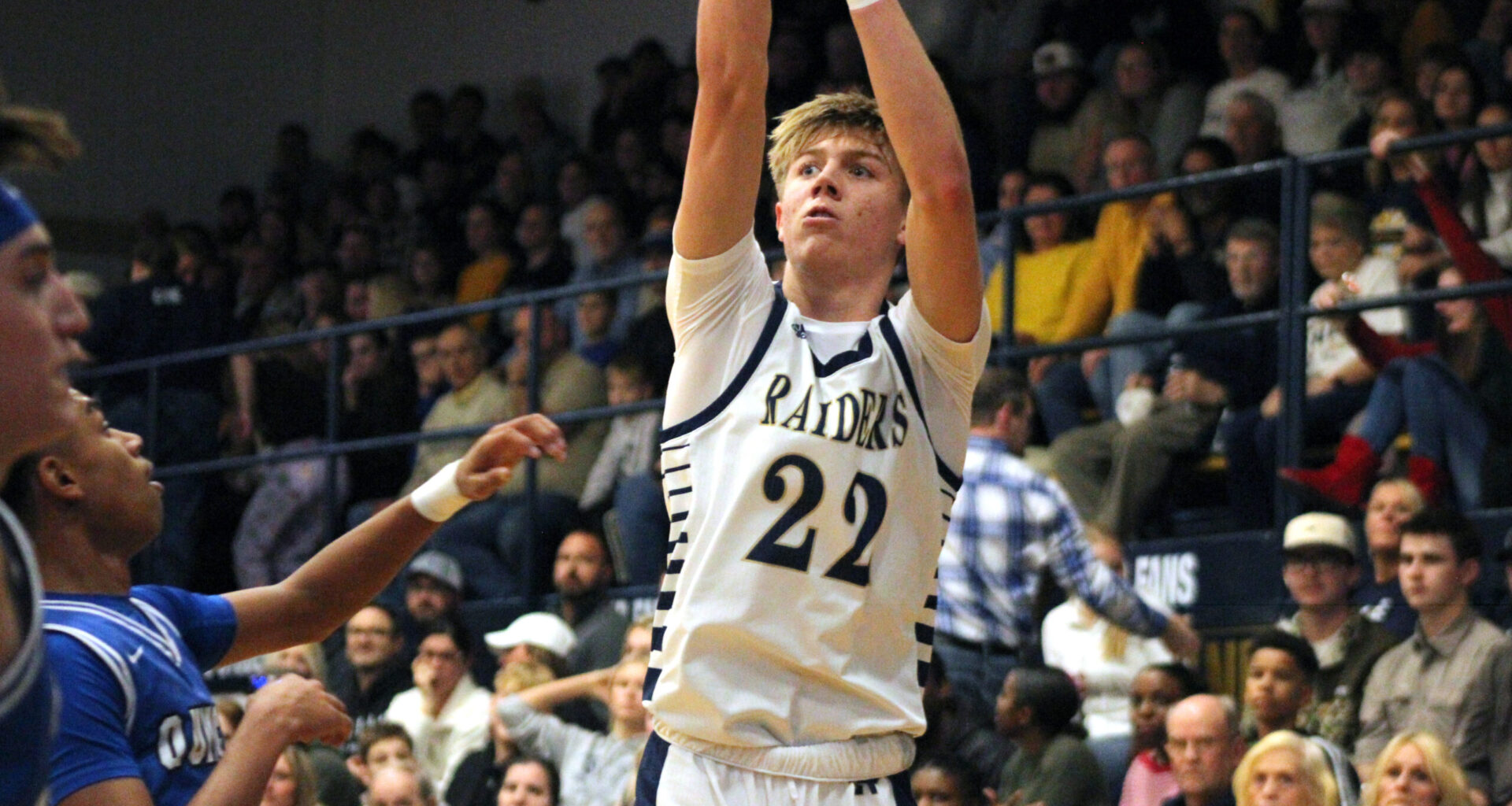 Photo gallery: QHS, QND boys basketball team engage in holiday treat for hoops fans