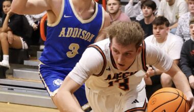 PREP BASKETBALL: Meek grinds out a 56-53 overtime win over rival Addison