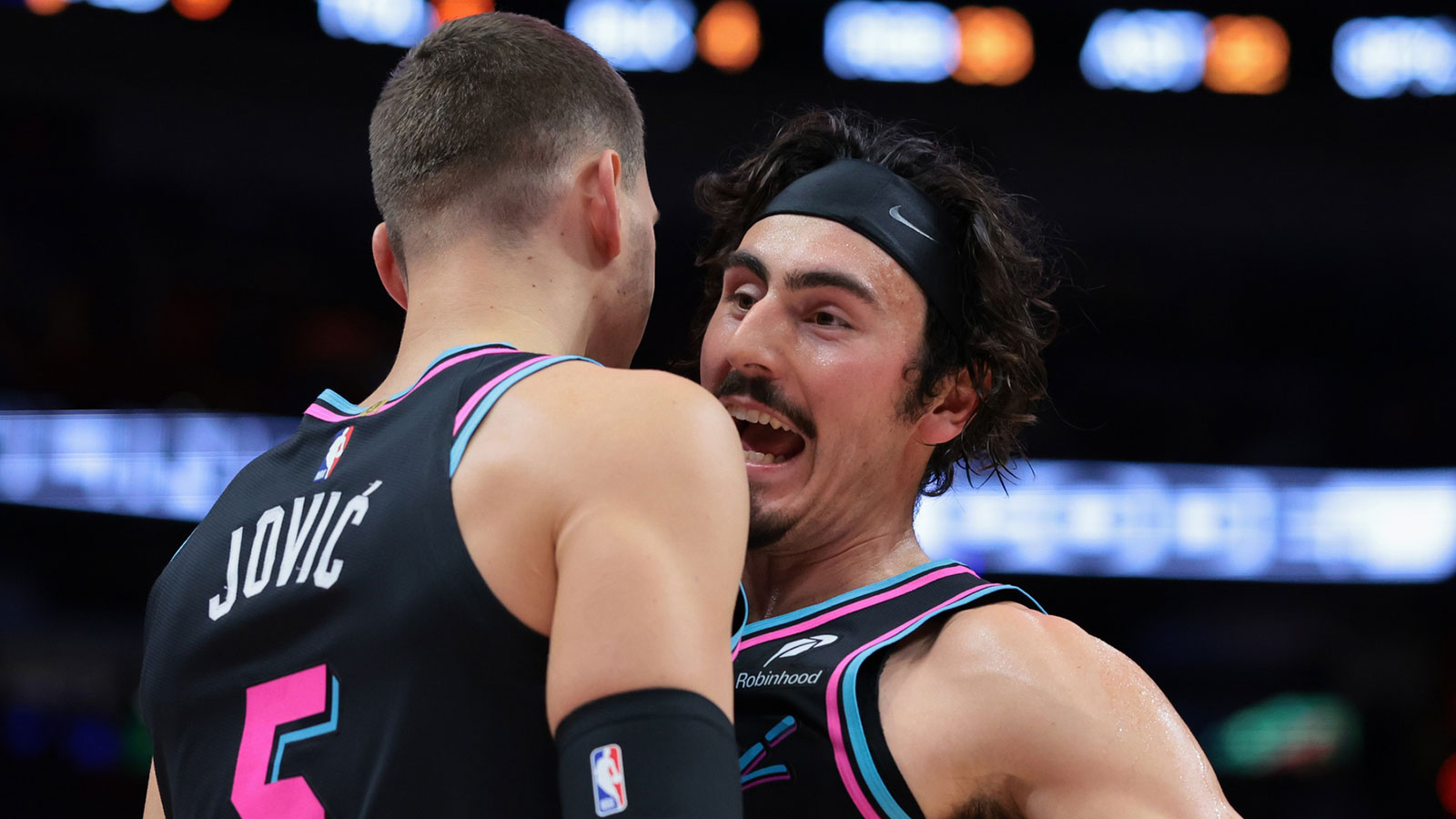 Miami Heat forward Jaime Jaquez Jr. (11) celebrates with forward Nikola Jovic (5) against the Indiana Pacers during the second half at Kaseya Center.