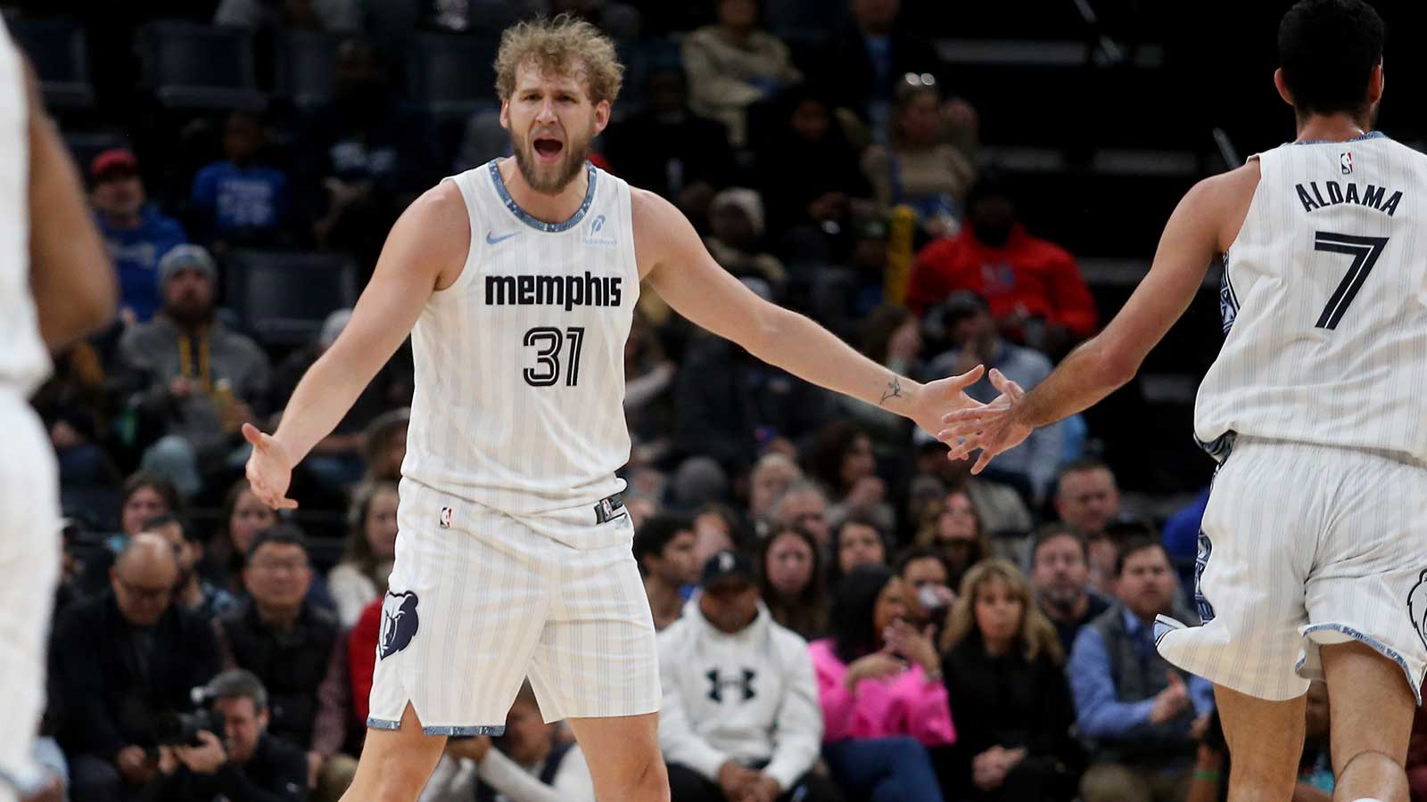 Memphis Grizzlies center Jock Landale (31) reacts with forward Santi Aldama (7) during the second quarter against the Los Angeles Clippers at FedExForum.