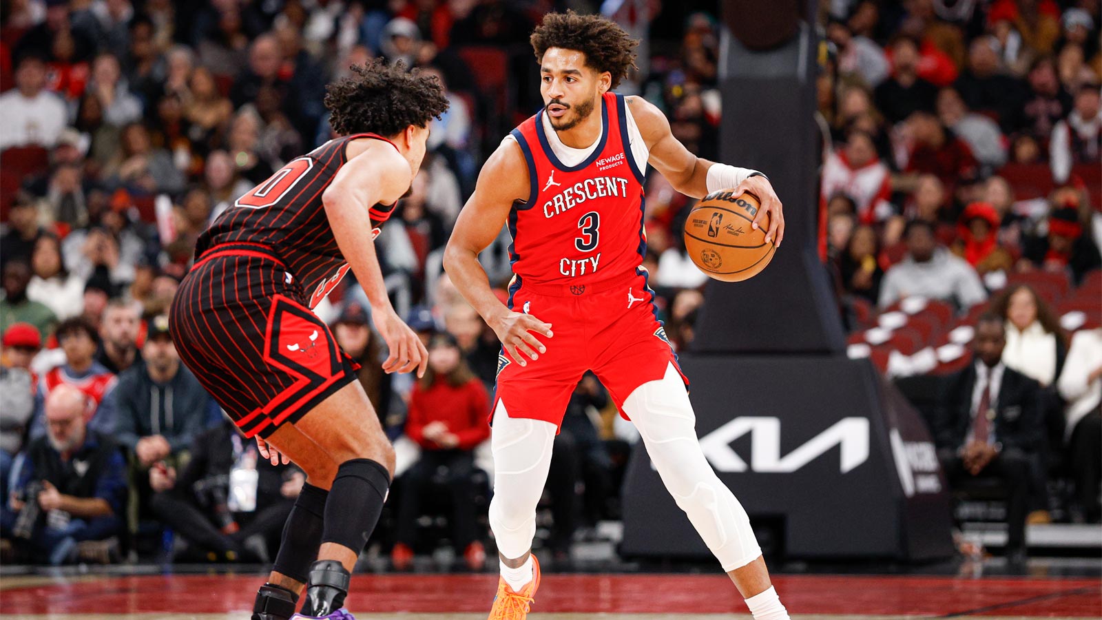 New Orleans Pelicans guard Jordan Poole (3) brings the ball up court against Chicago Bulls guard Tre Jones (30) during the second half at United Center.