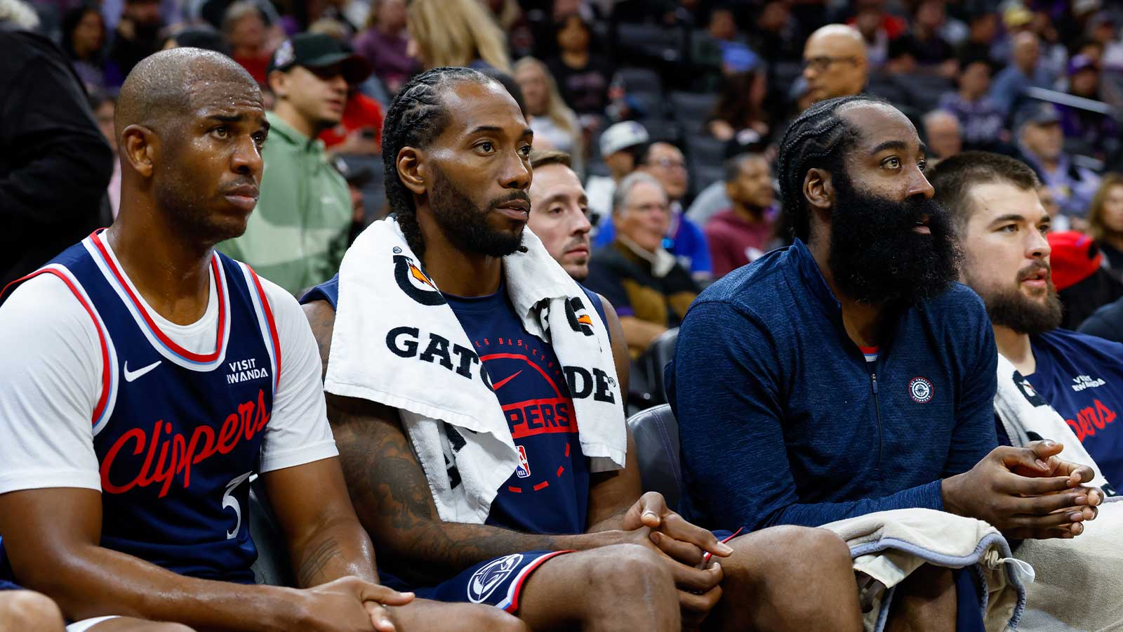 Los Angeles Clippers guard Chris Paul (3) and forward Kawhi Leonard (2) and guard James Harden (1) sit on the bench during the fourth quarter against the Sacramento Kings at Golden 1 Center.