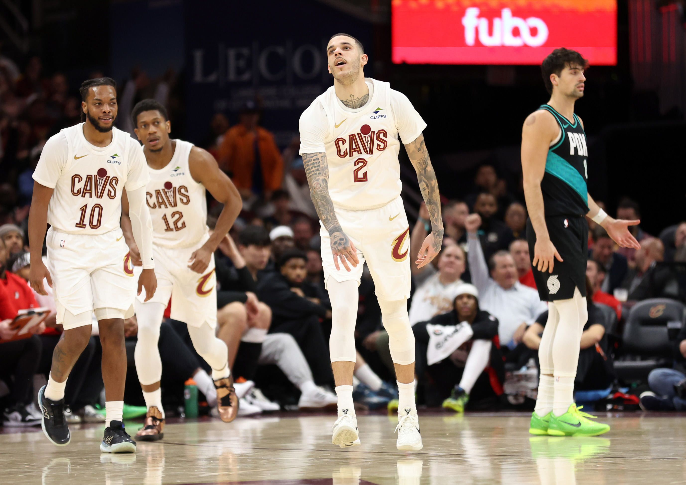 Cleveland Cavaliers guard Lonzo Ball reacts after finally hitting a three after many misses on the night against the Portland Trail Blazers in the second half of play. 