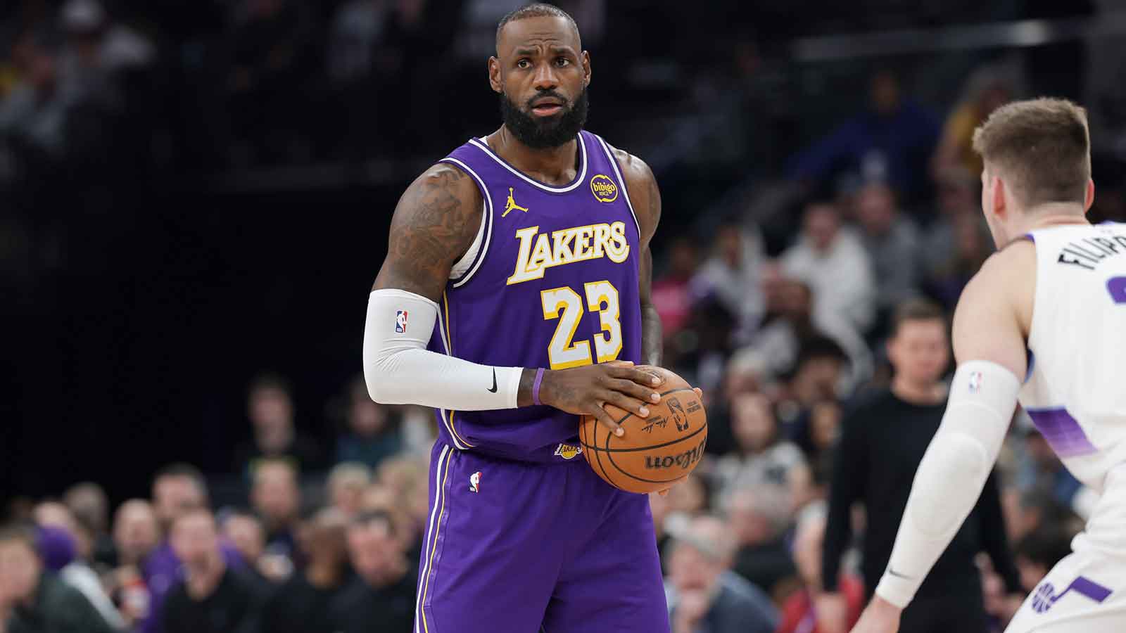 Los Angeles Lakers forward Lebron James (23) holds the ball during the second quarter against the Utah Jazz at Delta Center.