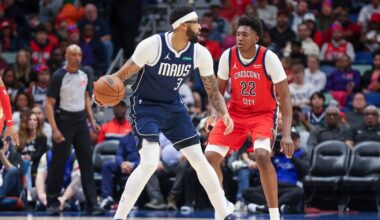 Dallas Mavericks forward Anthony Davis (3) tries to make a move against New Orleans Pelicans center Derik Queen (22) in the first half of an NBA basketball game Monday, Dec. 22, 2025, in New Orleans. (AP Photo/Peter Forest)