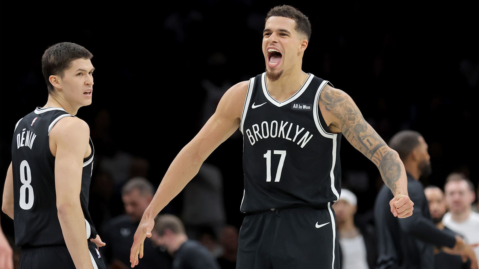 Brooklyn Nets forward Michael Porter Jr. (17) reacts with guard Egor Demin (8) during the fourth quarter against the Charlotte Hornets at Barclays Center.