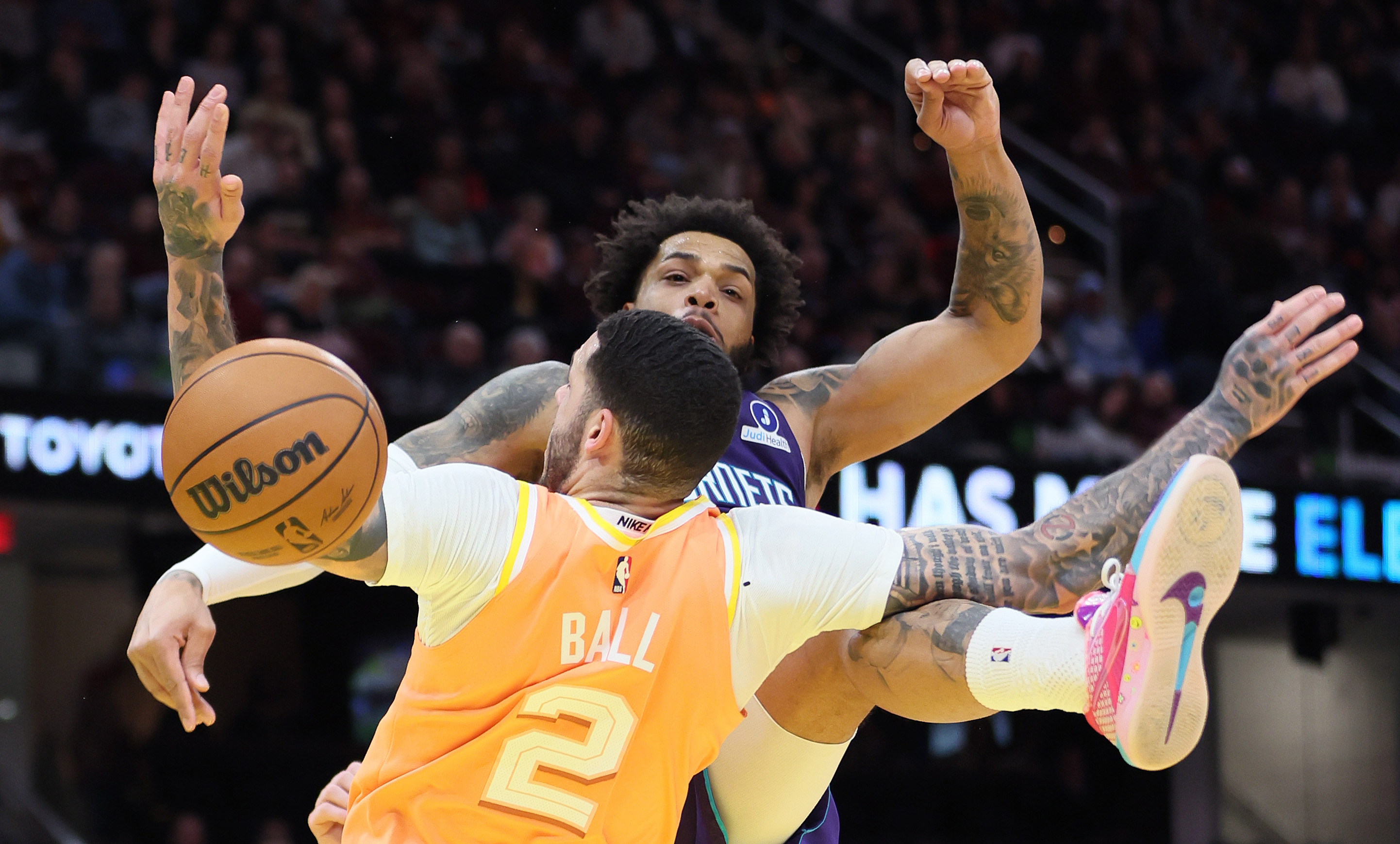 Charlotte Hornets forward Miles Bridges blocks the shot attempt of Cleveland Cavaliers guard Lonzo Ball in the second half at Rocket Arena.