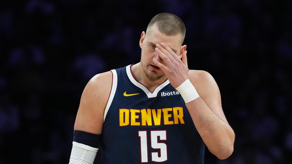 NBA roundup: Denver Nuggets falls to Miami Heat; Nikola Jokic sustains knee injury