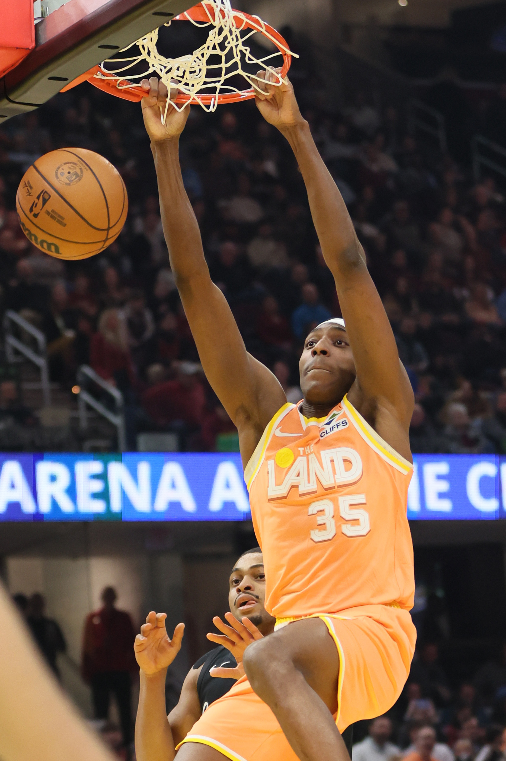 Cleveland Cavaliers forward Nah’Qwan Tomlin dunks the ball for a score guarded by San Antonio Spurs forward Keldon Johnson in the first half at Rocket Arena. 
