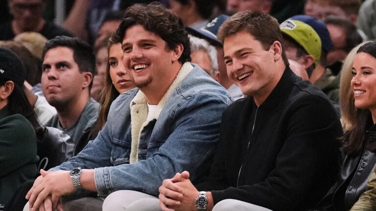 Patriots’ Will Campbell chugs beer while shirtless at Celtics game