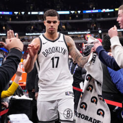 Brooklyn Nets forward Michael Porter Jr. celebrates with fans after the Nets defeated the Chicago Bulls in an NBA basketball game in Chicago, Wednesday, Dec. 3, 2025. (AP Photo/Nam Y. Huh)