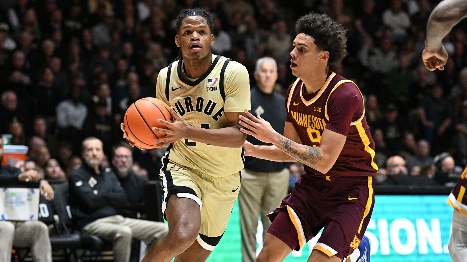 Purdue Boilermakers guard Gicarri Harris (24) drives toward the basket against Minnesota Golden Gophers guard Kai Shinholster (9) during the second half at Mackey Arena.