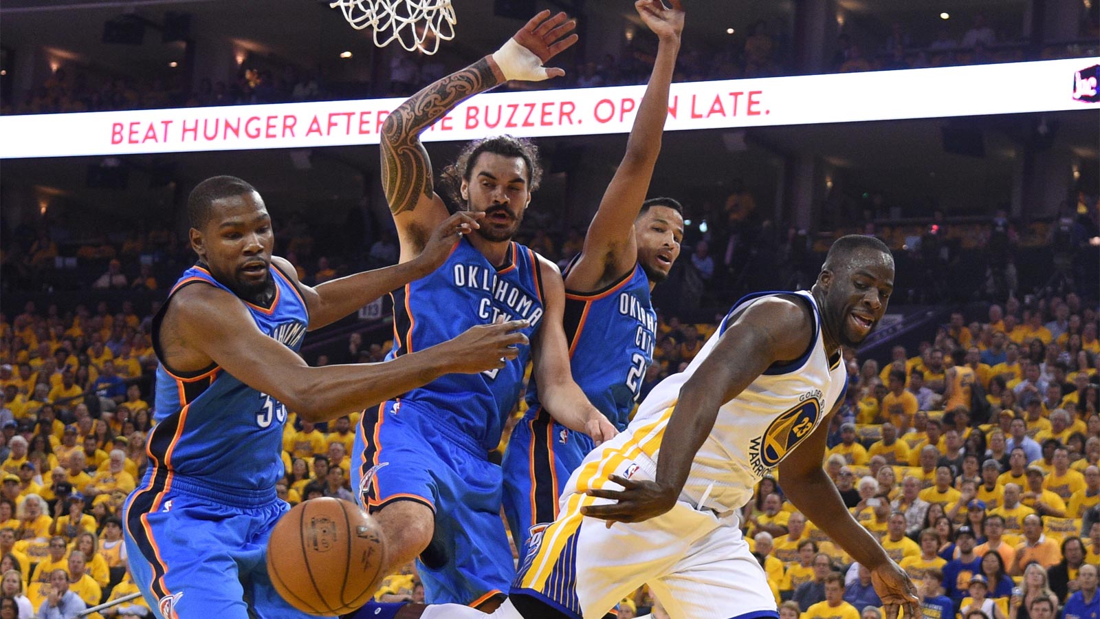 Thunder forward Kevin Durant (35), center Steven Adams (12), and guard Andre Roberson (21) during the first quarter in game two of the Western conference finals of the NBA Playoffs at Oracle Arena