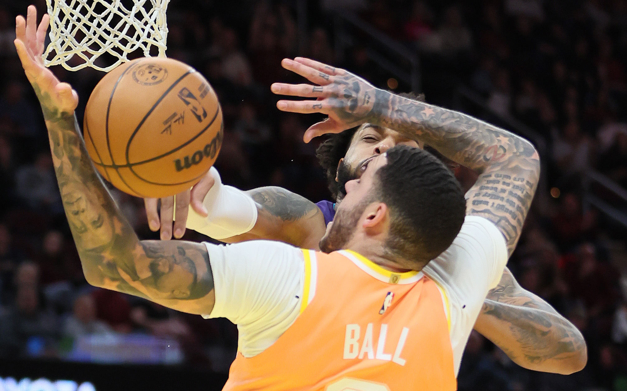 Charlotte Hornets forward Miles Bridges blocks the shot attempt of Cleveland Cavaliers guard Lonzo Ball in the second half at Rocket Arena.