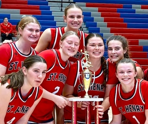 Northern Kentucky basketball teams return from holiday tournaments with championship trophies