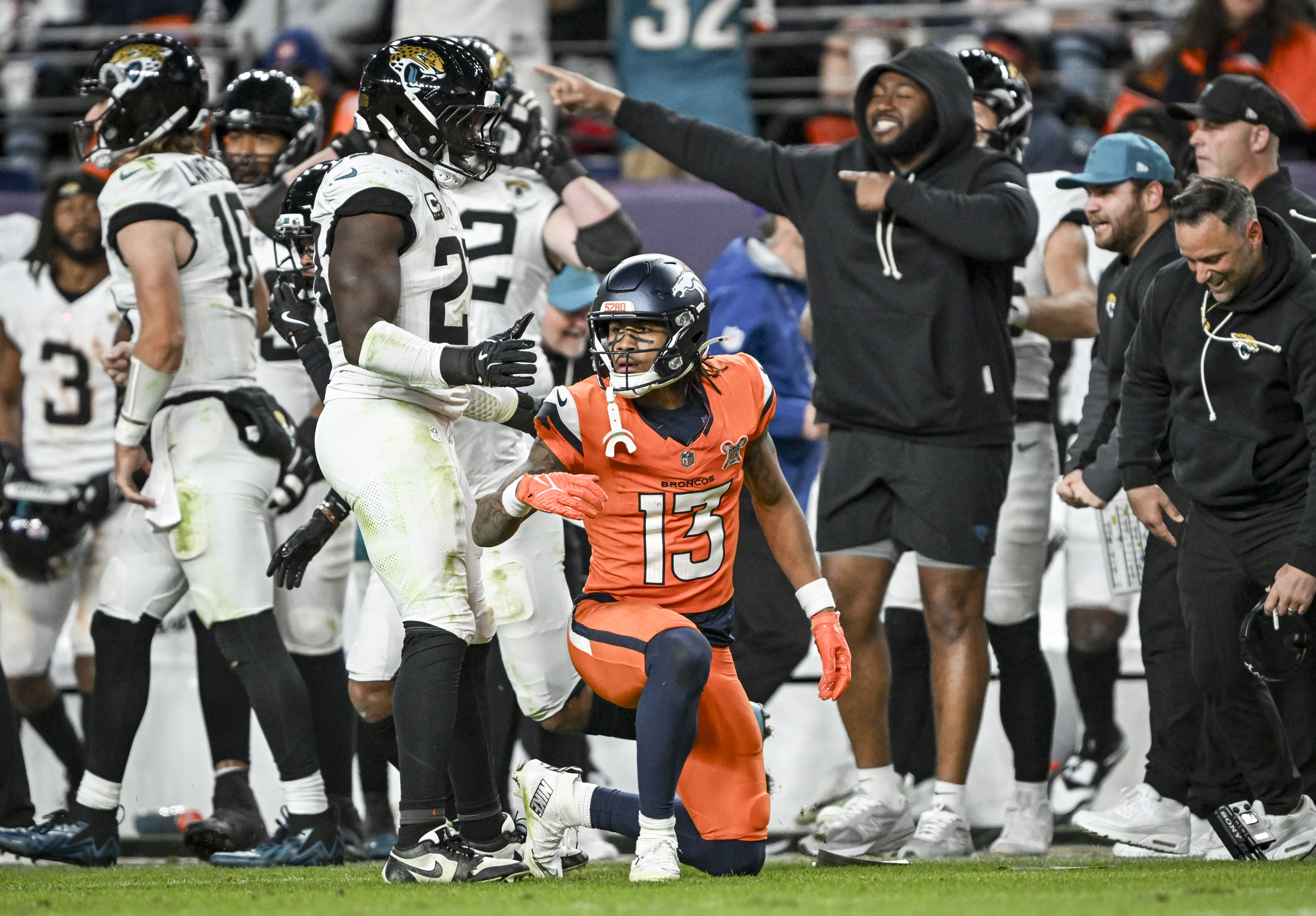 Pat Bryant (13) of the Denver Broncos reacts after Jarrian...