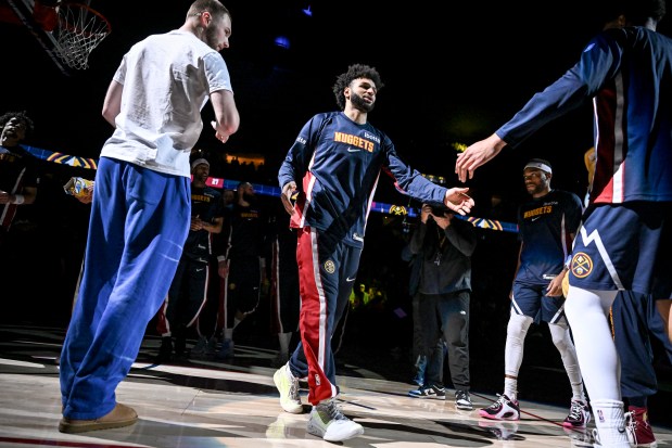 Jamal Murray (27) of the Denver Nuggets is introduced before the game against the Orlando Magic at Ball Arena in Denver on Thursday, Dec. 18, 2025. (Photo by AAron Ontiveroz/The Denver Post)