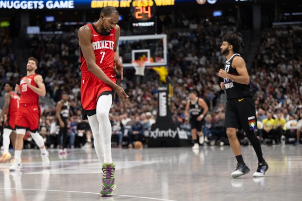 Houston Rockets forward Kevin Durant (7) celebrates a three-pointer during a 115-101 win over the Denver Nuggets during the second half on Saturday, Dec. 20, 2025, at Ball Arena in Denver. (Photo by Timothy Hurst/The Denver Post)
