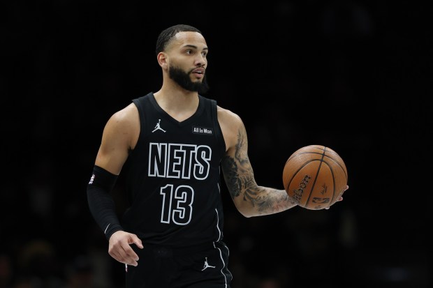 Tyrese Martin #13 of the Brooklyn Nets dribbles during the first half against the Philadelphia 76ers at Barclays Center on November 28, 2025 in the Brooklyn borough of New York City. NOTE TO USER: User expressly acknowledges and agrees that, by downloading and or using this photograph, User is consenting to the terms and conditions of the Getty Images License Agreement. (Photo by Sarah Stier/Getty Images)