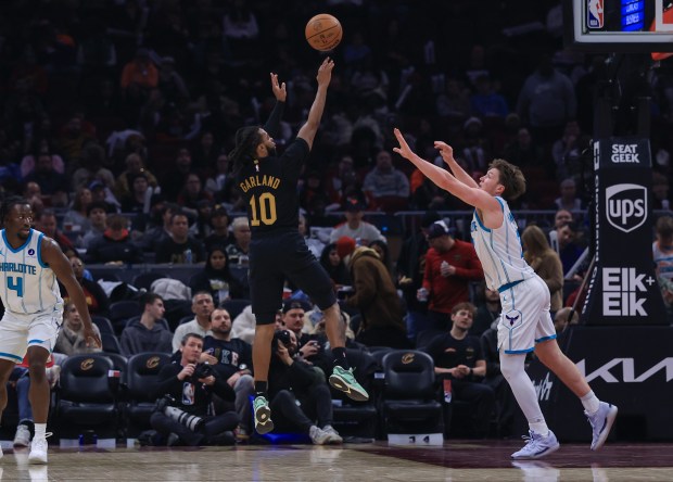 Darius Garland shoots during the Cavaliers' loss to the Hornets on Dec. 14. (Tim Phillis - For The News-Herald)
