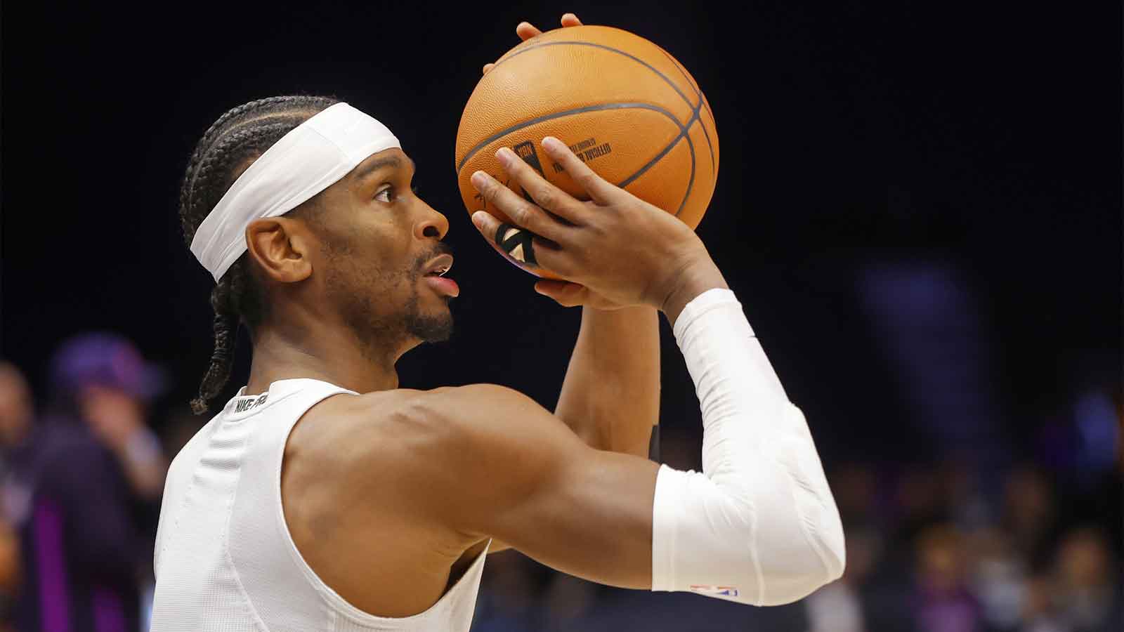 Thunder guard Shai Gilgeous-Alexander (2) prepares to play the Minnesota Timberwolves before the game at Target Center