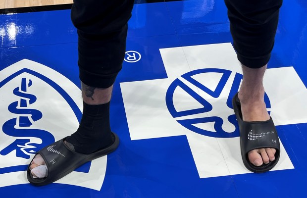 Heat guard Tyler Herro has his injured toe wrapped at Friday's shootaround in Orlando. (Ira Winderman, Sun Sentinel).