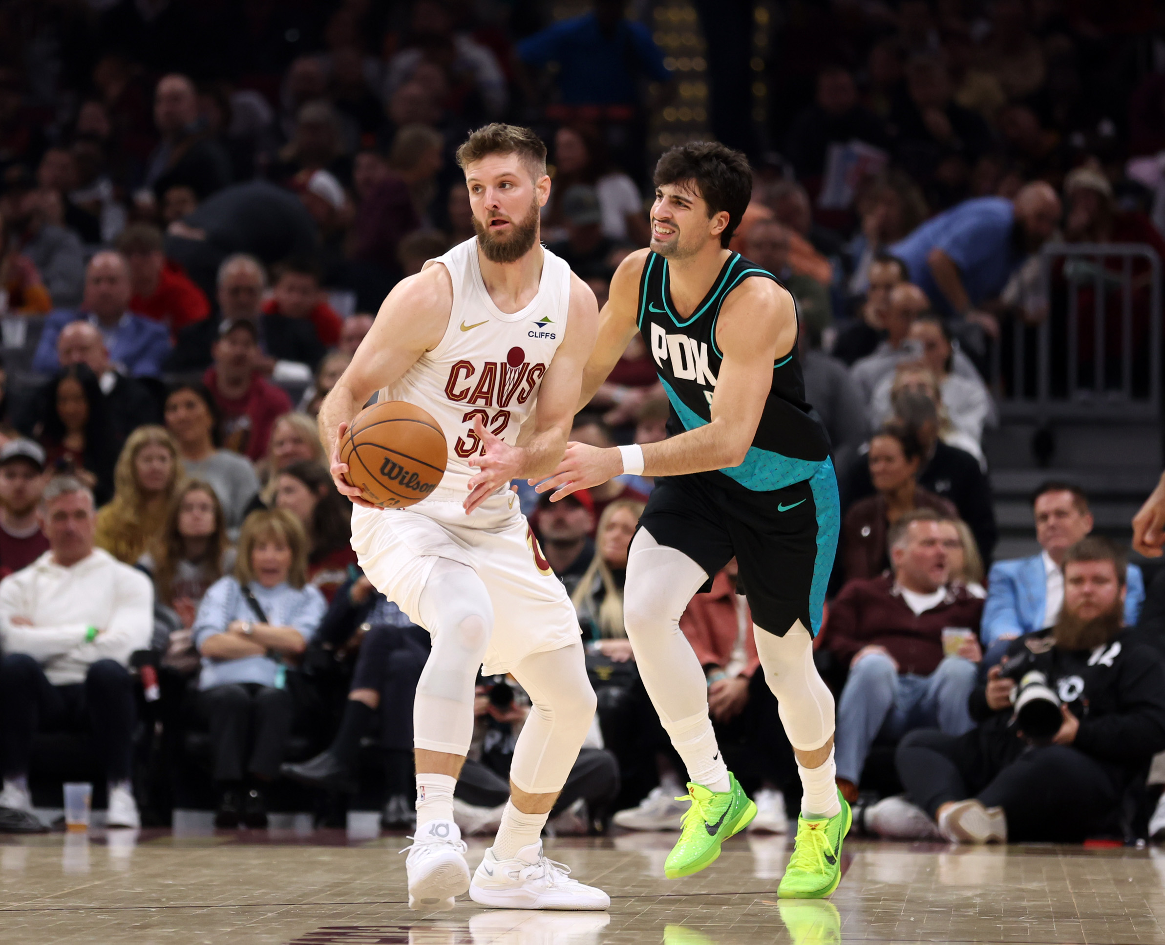 Cleveland Cavaliers forward Dean Wade steals a pass intended for Portland Trail Blazers forward Deni Avdija in the first half of play. 