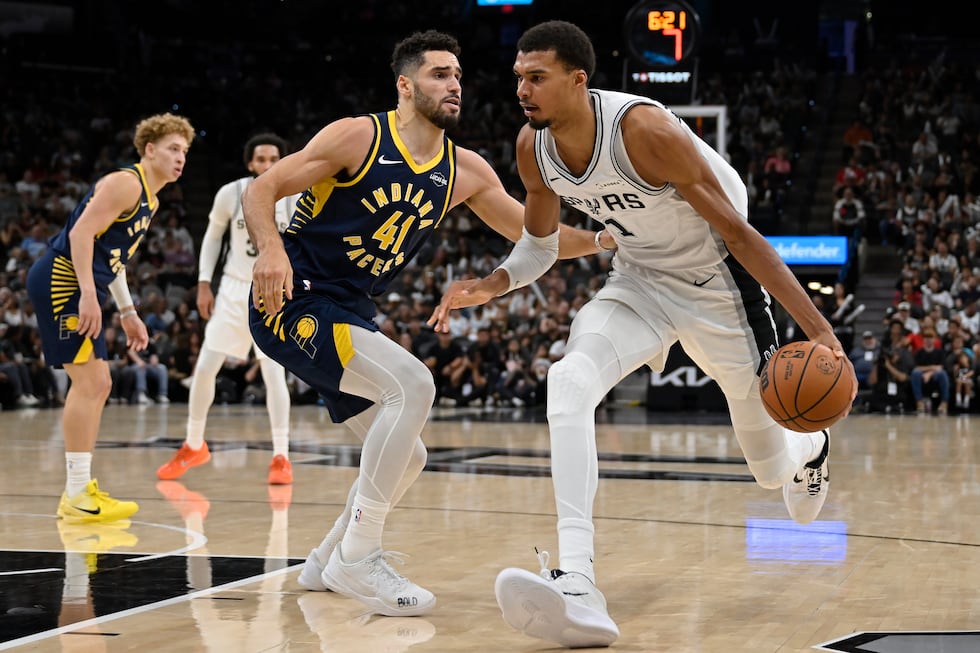 San Antonio Spurs forward Victor Wembanyama (1) drives against Indiana Pacers forward Gabe...
