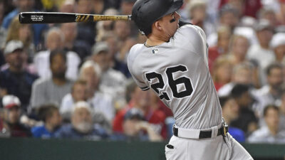 May 15, 2018; Washington, DC, USA; New York Yankees first baseman Tyler Austin (26) hits an RBI sacrifice fly against the Washington Nationals during the fifth inning at Nationals Park. Mandatory Credit: Brad Mills-USA TODAY Sports
