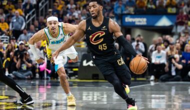 May 11, 2025; Indianapolis, Indiana, USA; Cleveland Cavaliers guard Donovan Mitchell (45) dribbles the ball while Indiana Pacers guard Andrew Nembhard (2) defends during game four of the second round for the 2025 NBA Playoffs at Gainbridge Fieldhouse. Mandatory Credit: Trevor Ruszkowski-Imagn Images