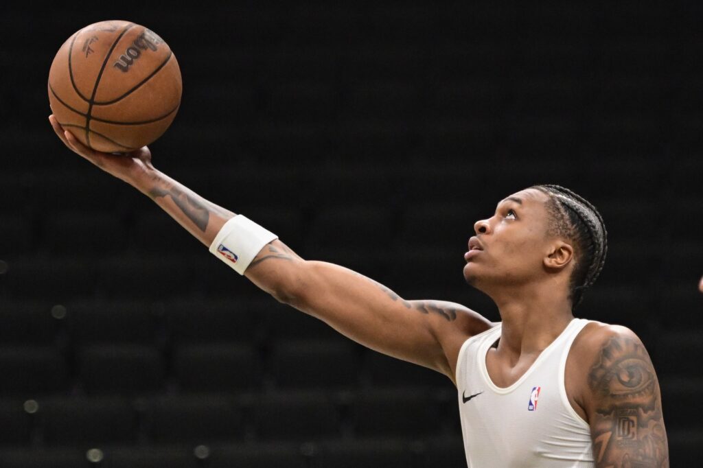Oct 9, 2025; Milwaukee, Wisconsin, USA; Milwaukee Bucks forward Tyler Smith (21) warms up before game against the Detroit Pistons at Fiserv Forum. Mandatory Credit: Benny Sieu-Imagn Images