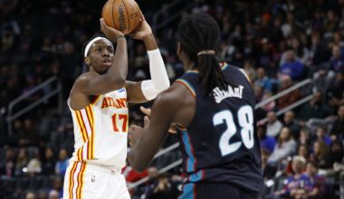 Dec 1, 2025; Detroit, Michigan, USA; Atlanta Hawks forward Onyeka Okongwu (17) shoots over Detroit Pistons forward Isaiah Stewart (28) in the first half t Little Caesars Arena. Mandatory Credit: Rick Osentoski-Imagn Images