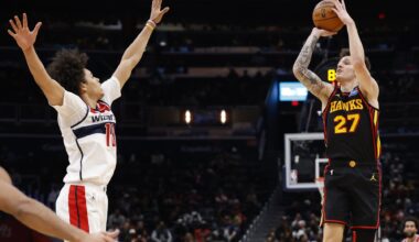 Atlanta Hawks guard Vit Krejci (27) shoots the ball as Washington Wizards forward Kyshawn George (18) defends in the second half at Capital One Arena.