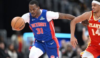Detroit Pistons guard Javonte Green (31) drives past Atlanta Hawks forward Asa Newell (14) after stealing the ball from him in the second quarter at Little Caesars Arena.
